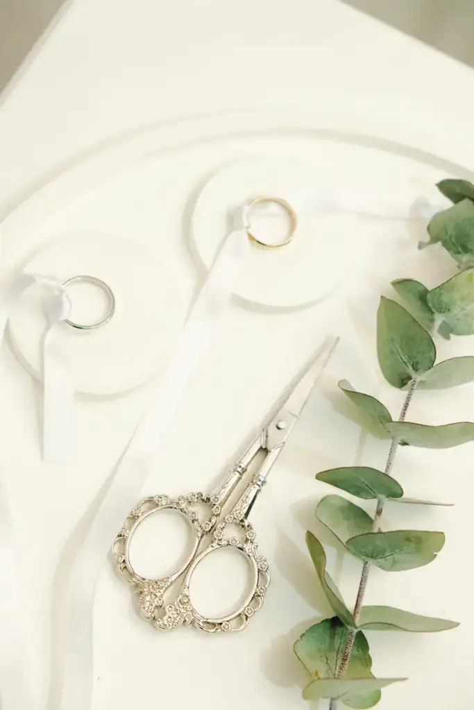 Rings, ribbon and eucalyptus