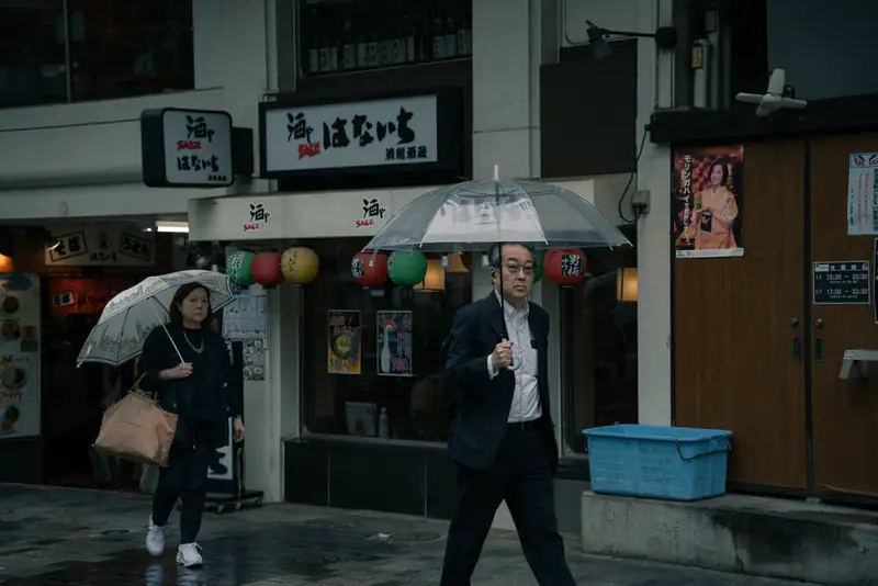 Umbrellas outside small shops