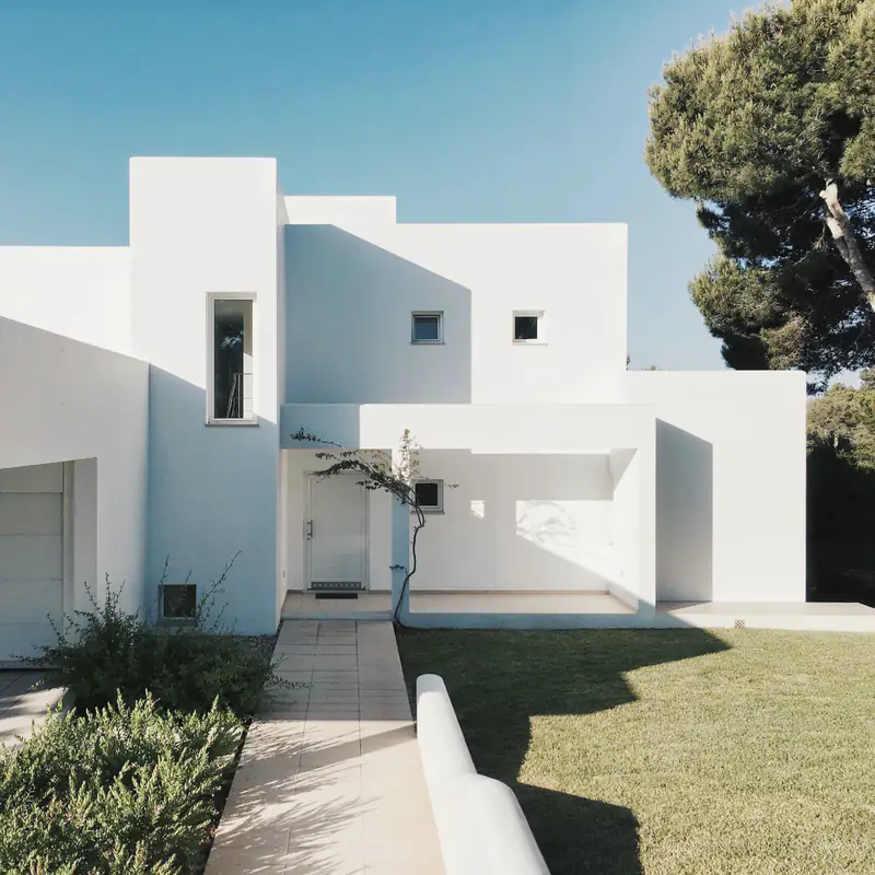 White cubic house in sunlight